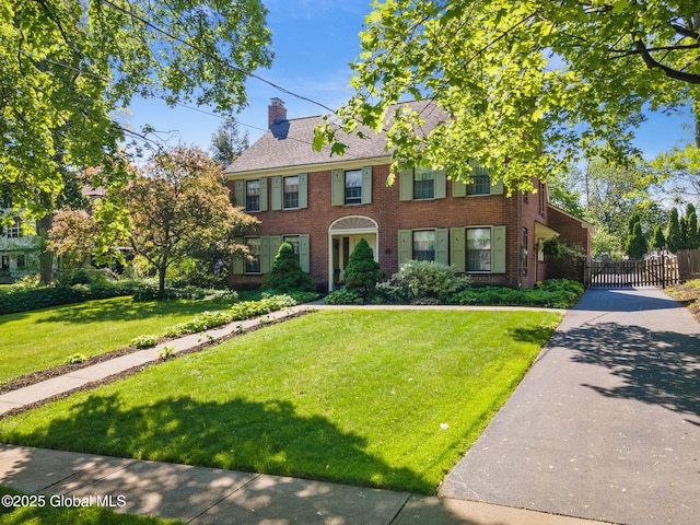 1435 Lowell Rd, Schenectady, NY 12308 - view of front of house featuring brick siding and a chimney