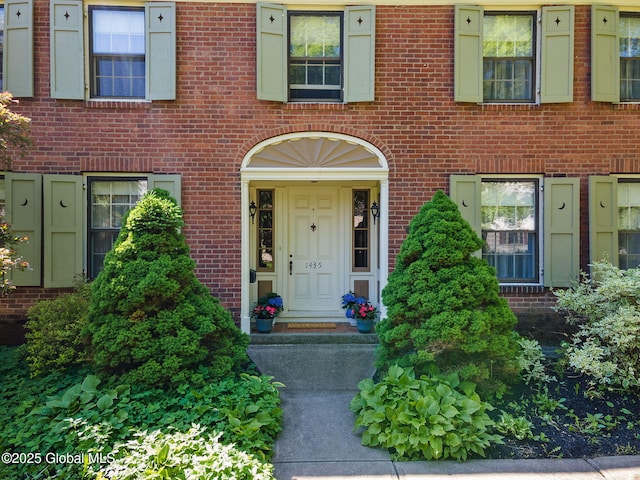 1435 Lowell Rd, Schenectady, NY 12308 - property entrance with brick siding