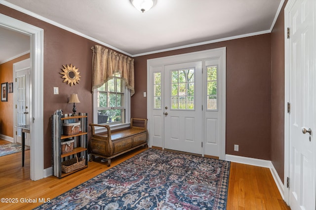 1435 Lowell Rd, Schenectady, NY 12308 - entryway with wood finished floors, baseboards, and ornamental molding