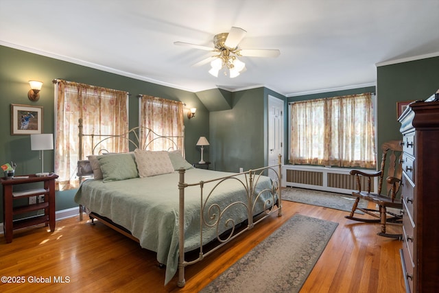 1435 Lowell Rd, Schenectady, NY 12308 - bedroom with radiator, ornamental molding, wood finished floors, ceiling fan, and baseboards