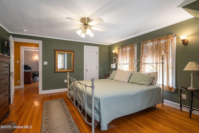 1435 Lowell Rd, Schenectady, NY 12308 - bedroom featuring wood finished floors, baseboards, ornamental molding, and ceiling fan