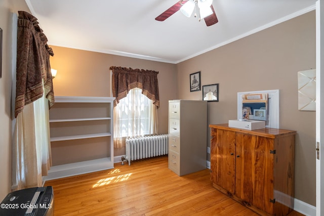 1435 Lowell Rd, Schenectady, NY 12308 - bedroom with radiator heating unit, light wood-style floors, crown molding, and a ceiling fan