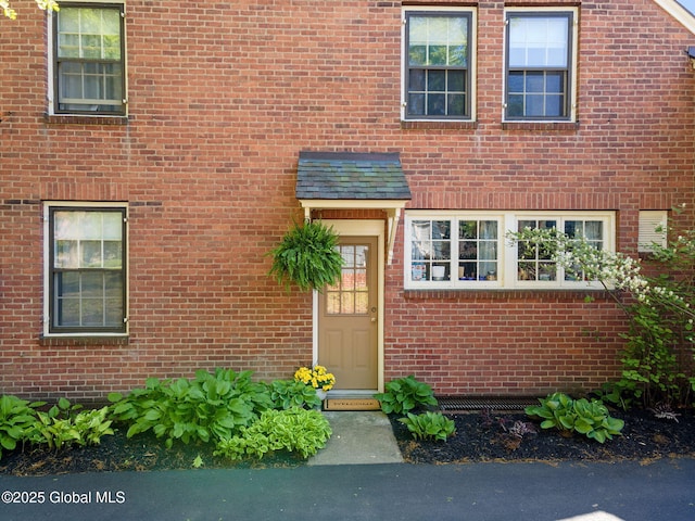 1435 Lowell Rd, Schenectady, NY 12308 - property entrance featuring brick siding