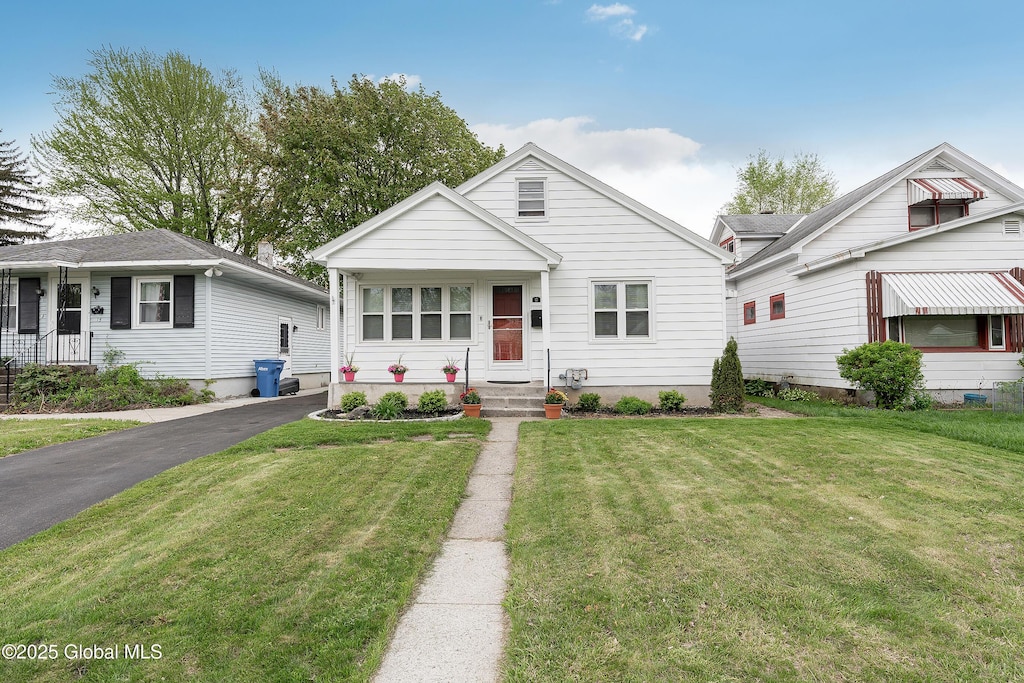17 Betwood St, Albany, NY 12209 - view of front of property featuring a front lawn