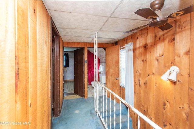 127 John St, Hudson Falls, NY 12839 - corridor featuring wood walls and carpet flooring