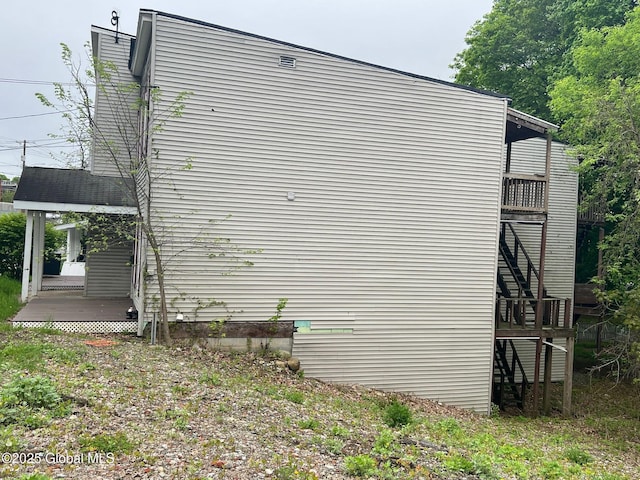 31-33 Malta Ave, Ballston Spa, NY 12020 - view of side of property with a wooden deck