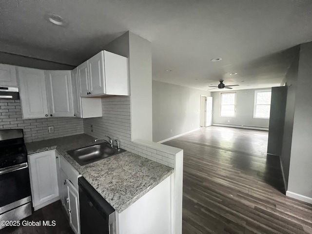 31-33 Malta Ave, Ballston Spa, NY 12020 - kitchen featuring stainless steel electric range oven, a sink, dishwashing machine, a ceiling fan, and under cabinet range hood