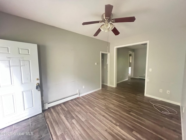 31-33 Malta Ave, Ballston Spa, NY 12020 - empty room featuring a baseboard heating unit, a ceiling fan, wood finished floors, and baseboards