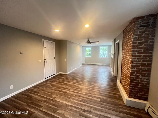 31-33 Malta Ave, Ballston Spa, NY 12020 - spare room with a ceiling fan, baseboard heating, dark wood-type flooring, baseboards, and recessed lighting