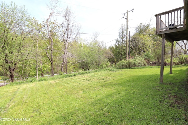 11 Filkins Ln, Voorheesville, NY 12186 - view of green lawn featuring a wooden deck