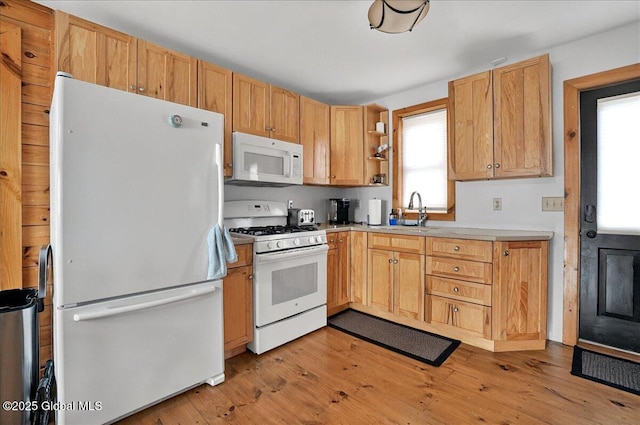 126 Lakeview Ln, Mayfield, NY 12117 - kitchen featuring white appliances, a sink, light countertops, light wood-type flooring, and open shelves