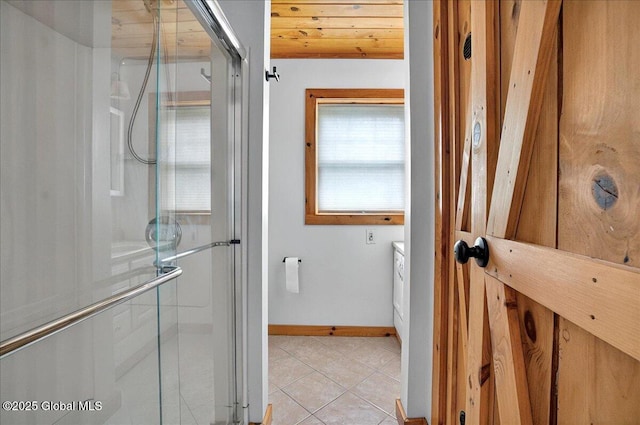 126 Lakeview Ln, Mayfield, NY 12117 - full bathroom featuring tile patterned flooring, a stall shower, and baseboards