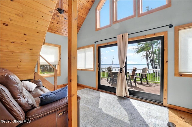 126 Lakeview Ln, Mayfield, NY 12117 - living room featuring wood finished floors, plenty of natural light, baseboards, wooden ceiling, and high vaulted ceiling