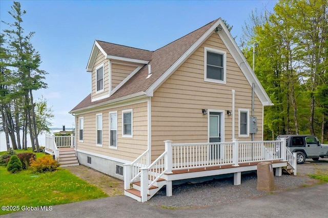 126 Lakeview Ln, Mayfield, NY 12117 - view of front facade with a wooden deck and roof with shingles