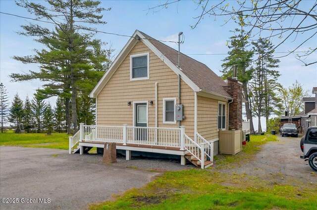 126 Lakeview Ln, Mayfield, NY 12117 - view of front of home featuring a wooden deck and a chimney