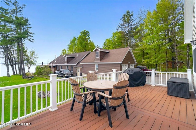 126 Lakeview Ln, Mayfield, NY 12117 - wooden deck featuring outdoor dining area and a lawn