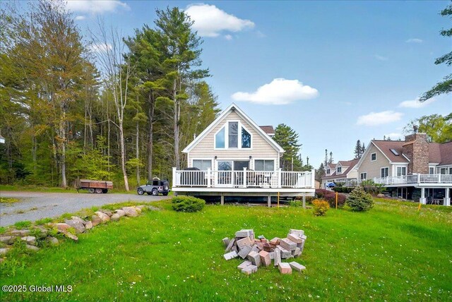 126 Lakeview Ln, Mayfield, NY 12117 - rear view of property featuring a deck and a lawn
