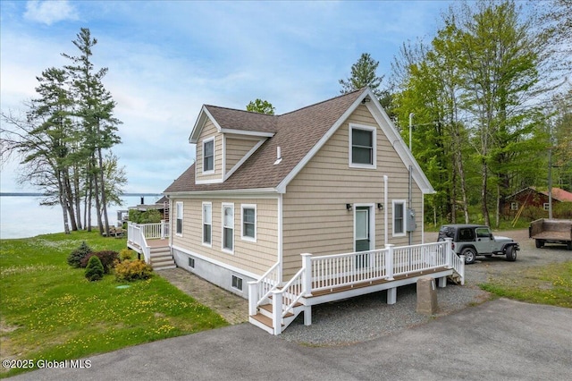 126 Lakeview Ln, Mayfield, NY 12117 - view of front facade featuring a wooden deck and roof with shingles