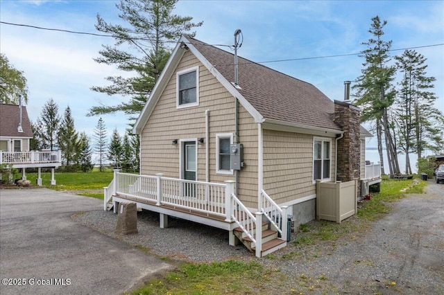 126 Lakeview Ln, Mayfield, NY 12117 - view of front of property with a shingled roof and a deck