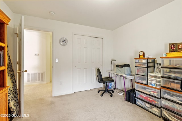 view of carpeted office space