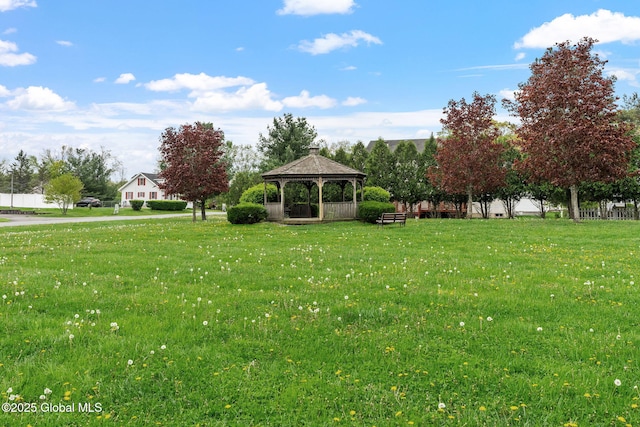 view of green lawn with a gazebo