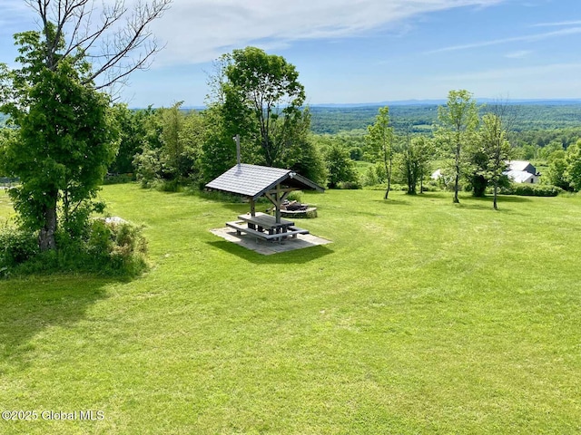 view of green lawn featuring a gazebo