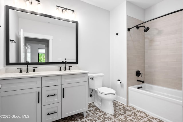 116 W Ave Unit 309, Saratoga Springs, NY 12866 - full bathroom featuring double vanity, toilet, tile patterned flooring, bathtub / shower combination, and baseboards