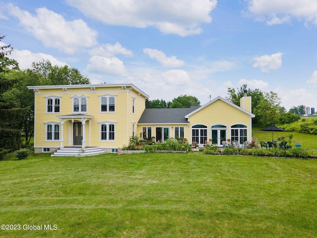 6510 State Route 10, Seward, NY 13459 - view of front of property featuring a chimney and a front yard