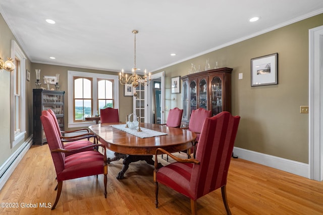 6510 State Route 10, Seward, NY 13459 - dining area with a chandelier, light wood-type flooring, baseboards, a baseboard heating unit, and ornamental molding
