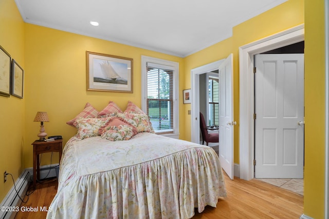 6510 State Route 10, Seward, NY 13459 - bedroom with ornamental molding, light wood-type flooring, a baseboard radiator, baseboards, and recessed lighting