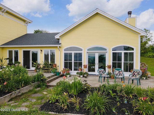 6510 State Route 10, Seward, NY 13459 - rear view of property with a wooden deck, french doors, a chimney, and a shingled roof
