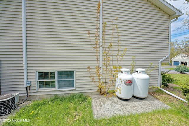 exterior view of heating fuel tank and central air condition unit