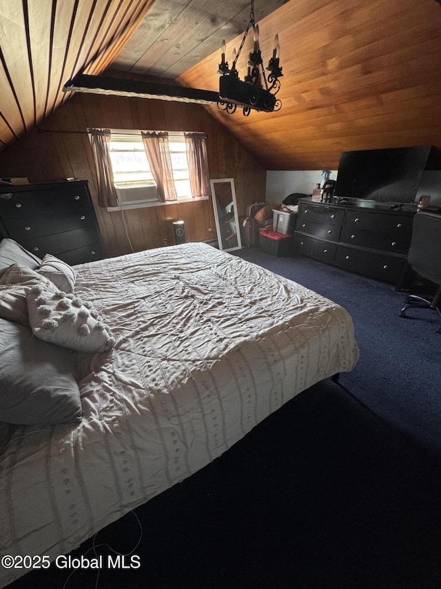 carpeted bedroom with vaulted ceiling, wood walls, and wood ceiling