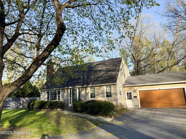 5 Moon Dr, Saratoga Springs, Inside, NY 12866 - view of front facade featuring driveway, a garage, and a chimney