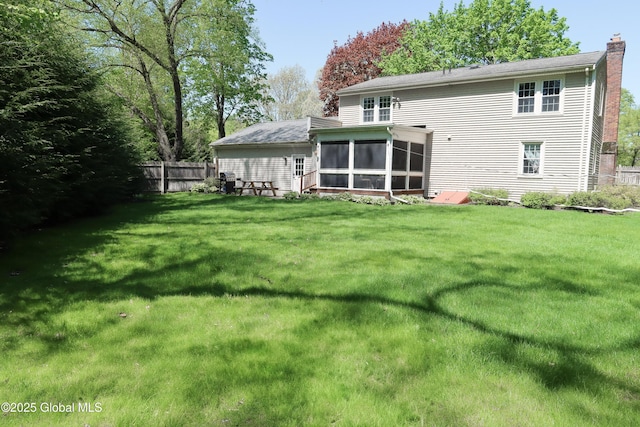 5 Moon Dr, Saratoga Springs, Inside, NY 12866 - rear view of property with a sunroom and a chimney