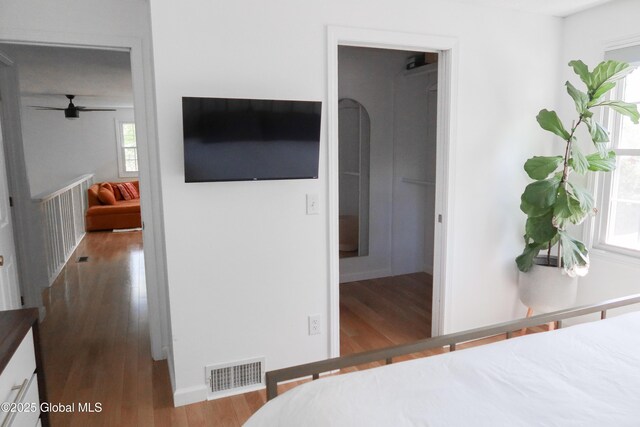 5 Moon Dr, Saratoga Springs, Inside, NY 12866 - bedroom featuring wood finished floors and a walk in closet