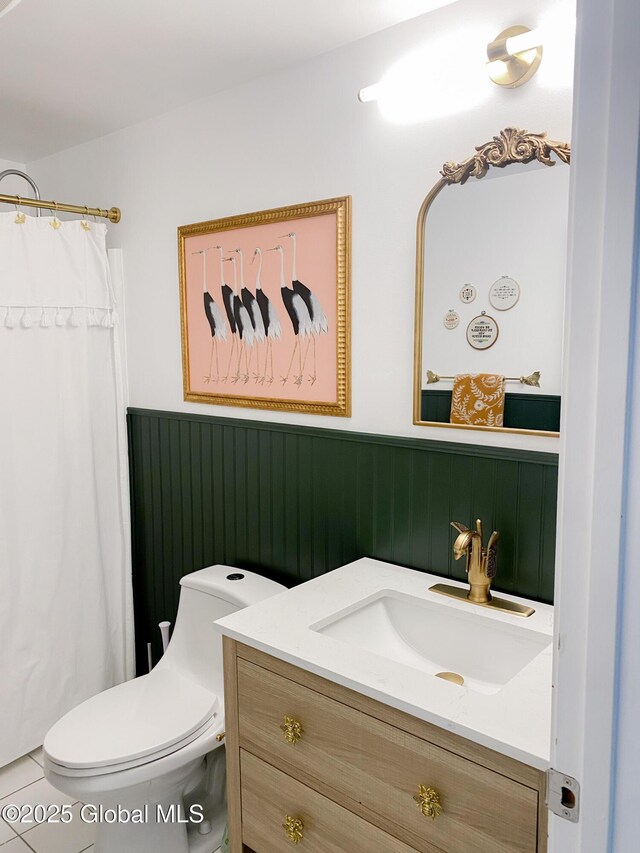 5 Moon Dr, Saratoga Springs, Inside, NY 12866 - full bath featuring a wainscoted wall, vanity, and toilet
