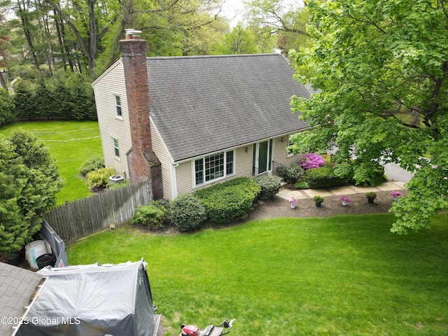 5 Moon Dr, Saratoga Springs, Inside, NY 12866 - rear view of house featuring a chimney and a shingled roof
