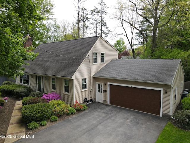 5 Moon Dr, Saratoga Springs, Inside, NY 12866 - new england style home featuring an attached garage, driveway, roof with shingles, and a chimney