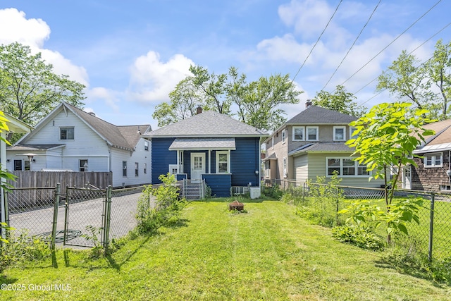 1250 Dean St, Niskayuna, NY 12309 - back of property with a gate and a shingled roof