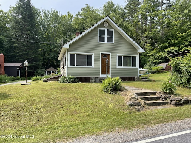 166 Finkle Rd, Bolton, NY 12814 - view of front of property featuring a front lawn