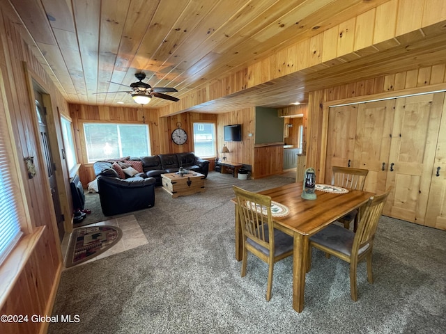 166 Finkle Rd, Bolton, NY 12814 - dining space featuring carpet flooring, wooden walls, a ceiling fan, and wooden ceiling