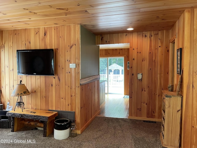 166 Finkle Rd, Bolton, NY 12814 - corridor featuring wooden ceiling, wooden walls, and carpet