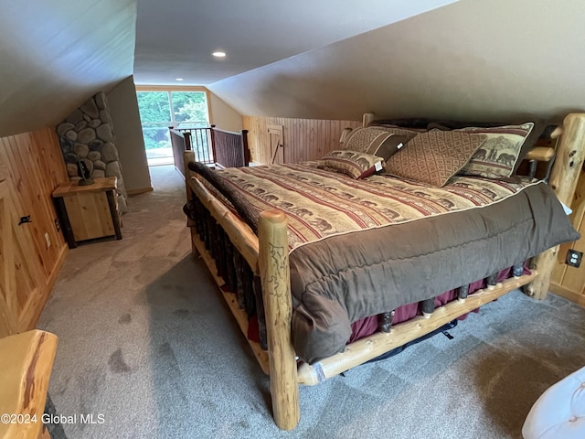 166 Finkle Rd, Bolton, NY 12814 - carpeted bedroom featuring wood walls, vaulted ceiling, and baseboards