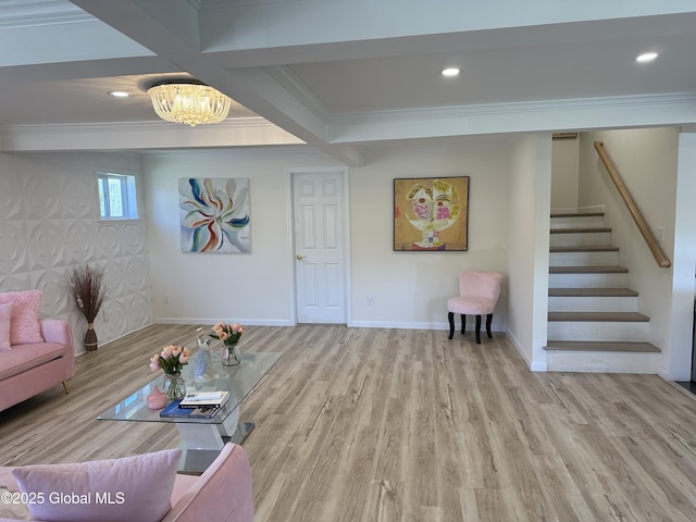 111 Rose St, Delanson, NY 12053 - living room featuring crown molding, a chandelier, wood finished floors, stairway, and baseboards