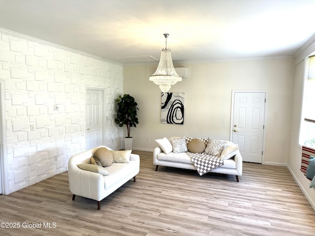 111 Rose St, Delanson, NY 12053 - living room featuring a chandelier, ornamental molding, light wood-style floors, and baseboards