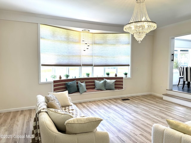 111 Rose St, Delanson, NY 12053 - living room featuring ornamental molding, a chandelier, wood finished floors, and baseboards