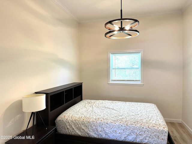 111 Rose St, Delanson, NY 12053 - bedroom with a chandelier, wood finished floors, ornamental molding, and baseboards