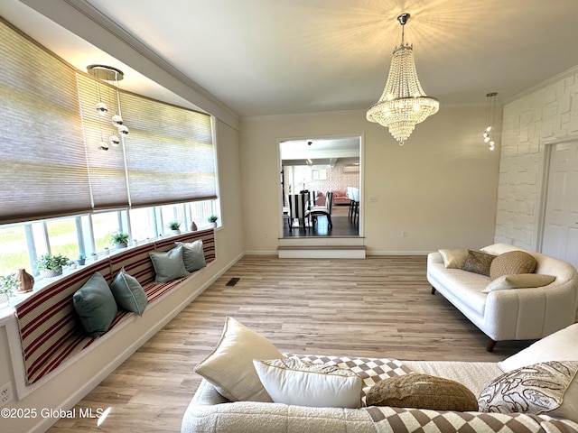 111 Rose St, Delanson, NY 12053 - living room with crown molding, a chandelier, light wood-style floors, and baseboards