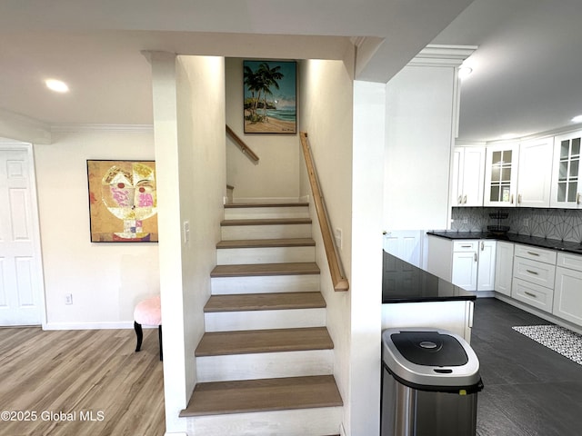 111 Rose St, Delanson, NY 12053 - stairway with ornamental molding, recessed lighting, baseboards, and wood finished floors